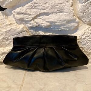 EUC FOSSIL Ladies Black Dumpling Clutch